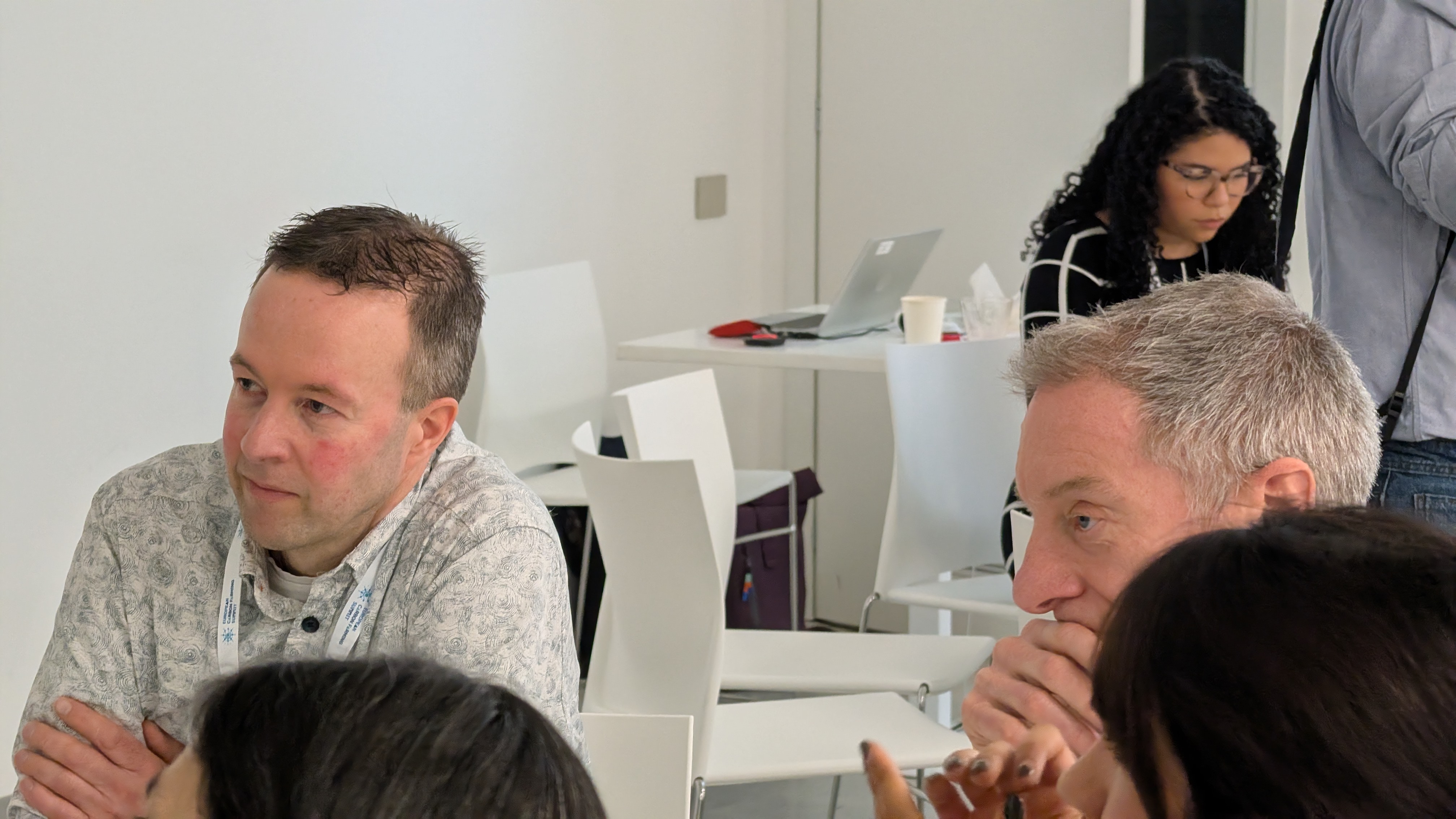 Researchers discussing results in a field setting.