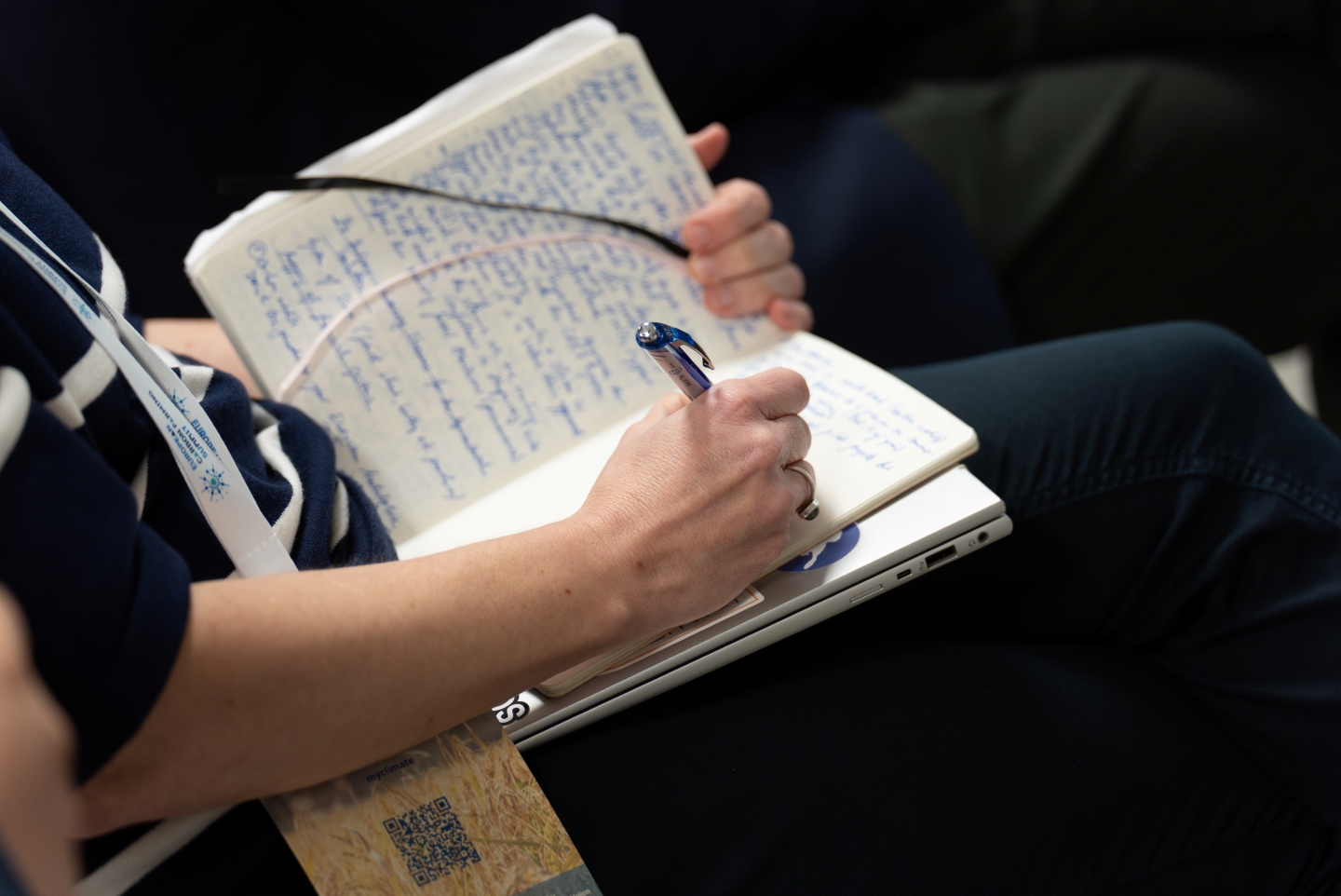 Researcher taking notes.